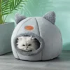 S7f49fbf1bce44168ab6766b2de431ec3S.webp Cat Head Cat House - Semi-Closed Sleep Cave with Non-Slip Base