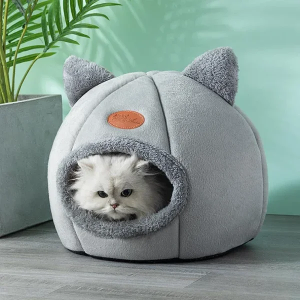 S7f49fbf1bce44168ab6766b2de431ec3S.webp Cat Head Cat House - Semi-Closed Sleep Cave with Non-Slip Base